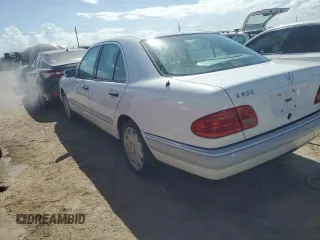 1996 Mercedes-Benz E Class with VIN WDBJF20F1TJ019480, listed as a Copart auction lot 76764114 with 0 mi miles and Salvage Title. Bid and sale history available at carsss.com. Image 2.