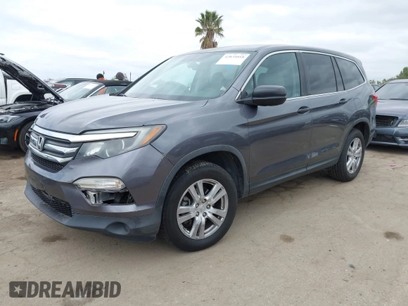 2016 Honda Pilot LX with VIN 5FNYF5H14GB037205, listed as a IAAI auction lot 42034018 with 101,943 mi miles and . Bid and sale history available at DreamBid. Image 2.