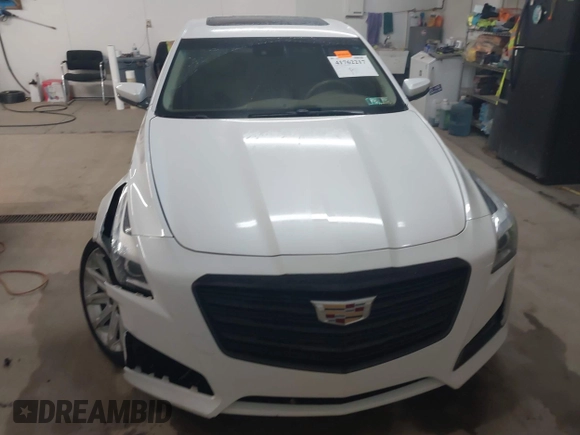 2015 Cadillac CTS Luxury AWD with VIN 1G6AX5SX5F0117267, listed as a IAAI auction lot 41762217 with 79,930 mi miles and . Bid and sale history available at DreamBid. Image 13.