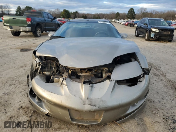 2001 Pontiac Firebird Firebird z VIN 2G2FS22K712109736, wystawiony jako Copart lot #87247004 z przebiegiem 84 965 mil mil oraz Czysty tytuł • Clean title. Historia ofert i sprzedaży dostępna na DreamBid. Obrazek 5.