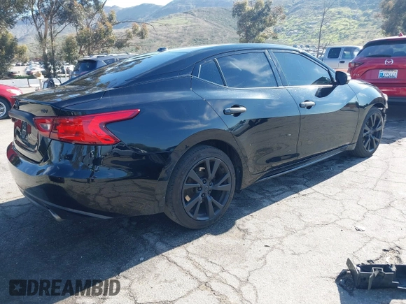 2018 Nissan Maxima S with VIN 1N4AA6AP9JC388366, listed as a IAAI auction lot 41842042 with 103,597 mi miles and . Bid and sale history available at DreamBid. Image 4.