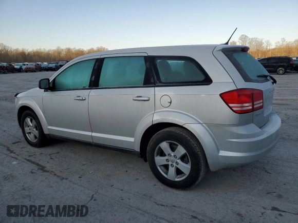 2013 Dodge Journey American Value with VIN 3C4PDCAB9DT604157, listed as a Copart auction lot 48206675 with 158,392 mi miles and Salvage Title. Bid and sale history available at DreamBid. Image 2.