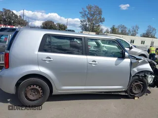 2009 Scion xB with VIN JTLKE50E991081756, listed as a IAAI auction lot 41952232 with 167,079 mi miles. Bid and sale history available at carsss.com. Image 13.