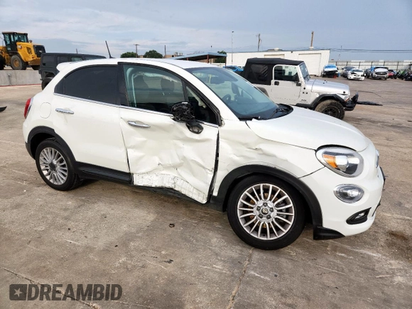 2018 FIAT 500X Lounge with VIN ZFBCFXDB9JP651302, listed as a Copart auction lot 59435875 with 63,186 mi miles and Salvage title. Bid and sale history available at DreamBid. Image 4.