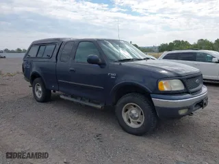 2000 Ford F-150 XL with VIN 1FTRX18L6YNB68229, listed as a IAAI auction lot 40141907 with 1 mi miles. Bid and sale history available at carsss.com. Image 1.