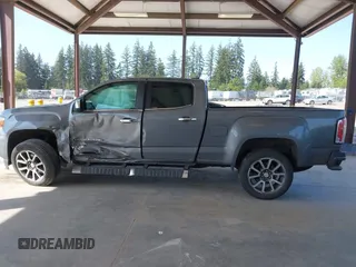 2021 GMC Canyon 4WD Denali with VIN 1GTG6EEN5M1102747, listed as a IAAI auction lot 42121134 with 60,412 mi miles and . Bid and sale history available at carsss.com. Image 14.