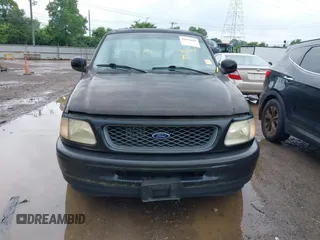 1998 Ford F-150 with VIN 1FTYF17W0WNC12927, listed as a IAAI auction lot 42621641 with 251,079 mi miles and . Bid and sale history available at DreamBid. Image 12.
