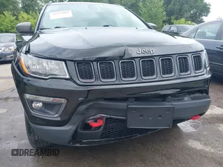 2018 Jeep Compass Trailhawk z VIN 3C4NJDDB1JT264032, wystawiony jako IAAI lot #42524893 z przebiegiem 96 399 mil mil oraz . Historia ofert i sprzedaży dostępna na DreamBid. Obrazek 6.