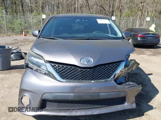 2015 Toyota Sienna SE with VIN 5TDXK3DC3FS682327, listed as a IAAI auction lot 41983156 with 141,640 mi miles. Bid and sale history available at carsss.com. Image 12.