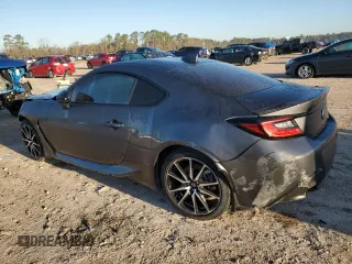 2023 Toyota 86 z VIN JF1ZNBB11P9765420, wystawiony jako Copart lot #48725015 z przebiegiem 12 979 mil mil oraz Szkoda całkowita • Salvage title. Historia ofert i sprzedaży dostępna na DreamBid. Obrazek 2.