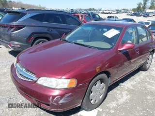 2000 Nissan Altima XE with VIN 1N4DL01D7YC193998, listed as a IAAI auction lot 41877560 with 177,697 mi miles. Bid and sale history available at carsss.com. Image 2.