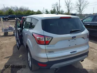2017 Ford Escape SE with VIN 1FMCU9G95HUA10906, listed as a IAAI auction lot 41841566 with 132,777 mi miles. Bid and sale history available at carsss.com. Image 3.