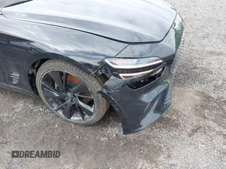 2023 Genesis G70 2.0T z VIN KMTG34TA8PU110168, wystawiony jako IAAI lot #41924246 z przebiegiem 117 927 mil mil oraz . Historia ofert i sprzedaży dostępna na DreamBid. Obrazek 18.