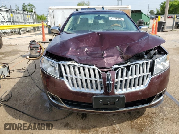 2011 Lincoln MKZ with VIN 3LNHL2JC0BR766629, listed as a Copart auction lot 56338015 with 118,728 mi miles and Salvage title. Bid and sale history available at DreamBid. Image 5.