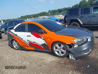 2014 Mitsubishi Lancer GT with VIN JA32U8FW6EU015415, listed as a IAAI auction lot 40171318 with 40,000 mi miles. Bid and sale history available at carsss.com. Image 1.