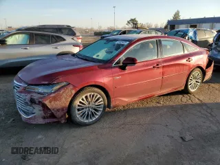 2019 Toyota Avalon Limited Hybrid z VIN 4T1B21FB7KU005379, wystawiony jako Copart lot #53625035 z przebiegiem 74 952 mil mil oraz Szkoda całkowita • Salvage title. Historia ofert i sprzedaży dostępna na DreamBid. Obrazek 1.