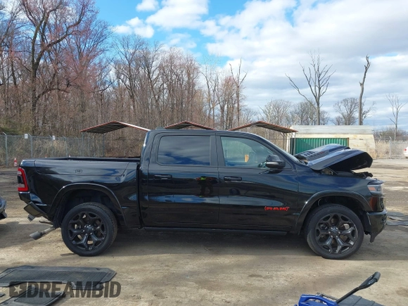 2022 Ram 1500 Limited z VIN 1C6SRFHM3NN412939, wystawiony jako IAAI lot #41813912 z przebiegiem 62 218 mil mil oraz . Historia ofert i sprzedaży dostępna na DreamBid. Obrazek 13.