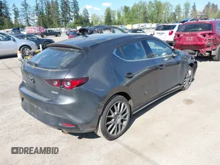 2022 Mazda Mazda3 Hatchback Premium with VIN JM1BPAML9N1518186, listed as a IAAI auction lot 42074112 with 23,722 mi miles. Bid and sale history available at carsss.com. Image 4.
