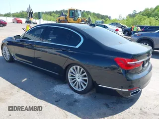 2016 BMW 7 Series 740i with VIN WBA7E2C55GG547752, listed as a IAAI auction lot 41992704 with Not Provided miles and . Bid and sale history available at carsss.com. Image 3.