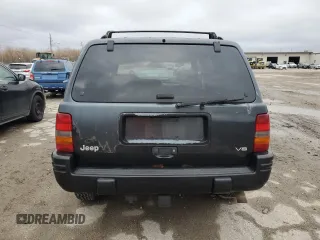 1998 Jeep Grand Cherokee Limited with VIN 1J4GZ78Y7WC163186, listed as a Copart auction lot 75011954 with 247,991 mi miles and Salvage Title. Bid and sale history available at carsss.com. Image 6.
