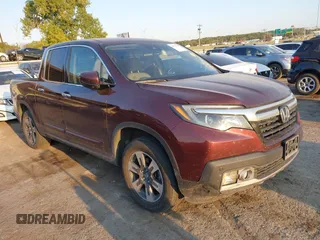 2017 Honda Ridgeline RTL-E with VIN 5FPYK3F74HB029959, listed as a IAAI auction lot 40530840 with 95,596 mi miles and . Bid and sale history available at DreamBid. Image 1.