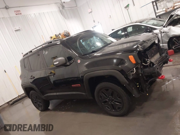 2018 Jeep Renegade Trailhawk z VIN ZACCJBCB7JPH91187, wystawiony jako IAAI lot #41984322 z przebiegiem 72 881 mil mil oraz . Historia ofert i sprzedaży dostępna na DreamBid. Obrazek 14.