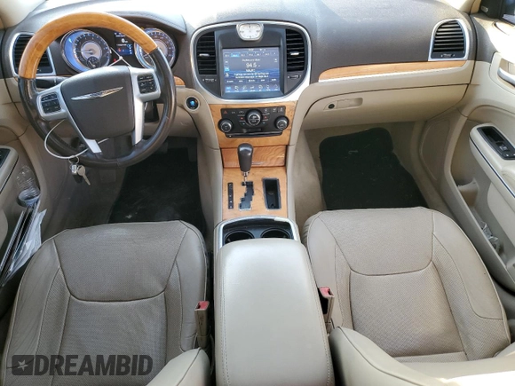 2012 Chrysler 300 C with VIN 2C3CCAKT3CH197140, listed as a Copart auction lot 82628384 with 167,304 mi miles and Salvage Title. Bid and sale history available at DreamBid. Image 8.