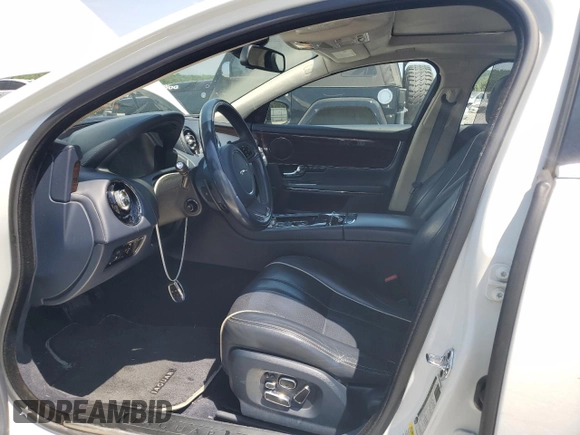 2011 Jaguar XJ XJL with VIN SAJWA2GB6BLV14612, listed as a Copart auction lot 63660355 with 93,763 mi miles and Salvage title. Bid and sale history available at DreamBid. Image 7.