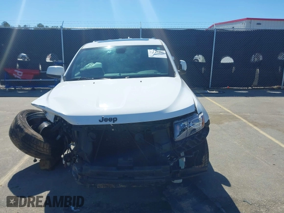 2015 Jeep Grand Cherokee Altitude with VIN 1C4RJEAG4FC815743, listed as a IAAI auction lot 41815095 with 106,867 mi miles. Bid and sale history available at carsss.com. Image 13.