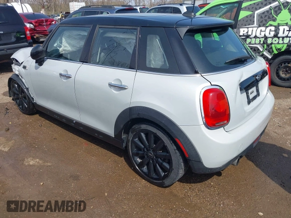 2016 MINI Hardtop 4 Door z VIN WMWXU1C54G2A93779, wystawiony jako IAAI lot #41933339 z przebiegiem 85 000 mil mil oraz . Historia ofert i sprzedaży dostępna na DreamBid. Obrazek 3.