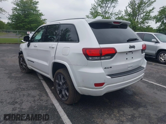 2021 Jeep Grand Cherokee 80th Anniversary with VIN 1C4RJFBG2MC568028, listed as a IAAI auction lot 42381104 with 51,027 mi miles and . Bid and sale history available at DreamBid. Image 3.