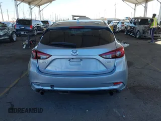 2018 Mazda 3 Touring with VIN 3MZBN1L31JM163466, listed as a IAAI auction lot 40777124 with 101,497 mi miles and . Bid and sale history available at carsss.com. Image 15.