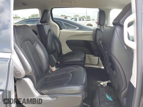 2023 Chrysler Pacifica Hybrid Touring L with VIN 2C4RC1L75PR611901, listed as a IAAI auction lot 42626500 with 44,156 mi miles and . Bid and sale history available at DreamBid. Image 8.