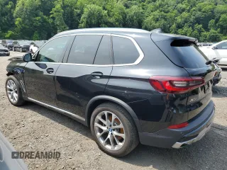 2023 BMW X5 xDrive45e z VIN 5UXTA6C09P9R00571, wystawiony jako Copart lot #61052995 z przebiegiem 9 702 mil mil oraz Szkoda całkowita • Salvage title. Historia ofert i sprzedaży dostępna na DreamBid. Obrazek 2.