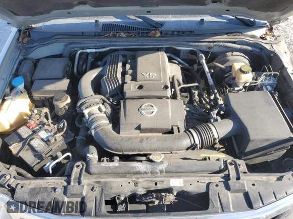 2015 Nissan Frontier S with VIN 1N6AD0EV3FN705610, listed as a Copart auction lot 77530764 with 165,782 mi miles and Salvage title. Bid and sale history available at DreamBid. Image 12.