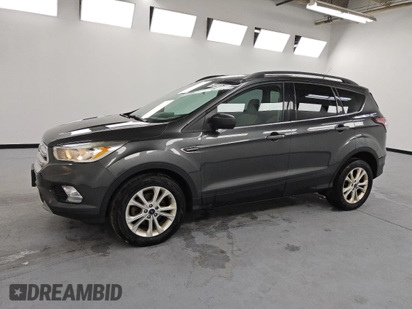 2018 Ford Escape SE with VIN 1FMCU0GD6JUA74555, listed as a Copart auction lot 54448535 with 114,848 mi miles and Clean Title. Bid and sale history available at carsss.com. Image 1.