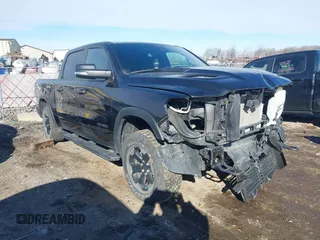 2021 Ram 1500 Rebel with VIN 1C6SRFLT8MN594702, listed as a IAAI auction lot 41534980 with 65,744 mi miles and . Bid and sale history available at DreamBid. Image 1.