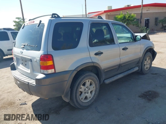2006 Ford Escape XLT z VIN 1FMCU93136KC15231, wystawiony jako IAAI lot #42625410 z przebiegiem 117 479 mil mil oraz . Historia ofert i sprzedaży dostępna na DreamBid. Obrazek 4.