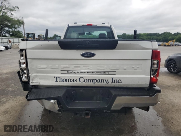 2021 Ford F-250 XL with VIN 1FTBF2A60MEC77777, listed as a Copart auction lot 59657405 with 123,103 mi miles and Salvage title. Bid and sale history available at DreamBid. Image 6.