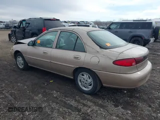 1999 Ford Escort SE with VIN 1FAFP13P3XW253542, listed as a IAAI auction lot 41691407 with 93,221 mi miles. Bid and sale history available at carsss.com. Image 3.