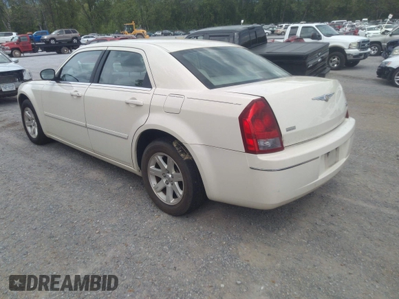 2005 Chrysler 300 Touring with VIN 2C3AA53G75H663208, listed as a IAAI auction lot 42180449 with 353,034 mi miles and . Bid and sale history available at carsss.com. Image 3.