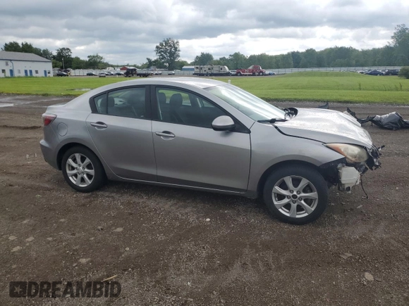 2011 Mazda 3 i Touring with VIN JM1BL1VF3B1491700, listed as a Copart auction lot 61573885 with 145,626 mi miles and Salvage title. Bid and sale history available at DreamBid. Image 4.