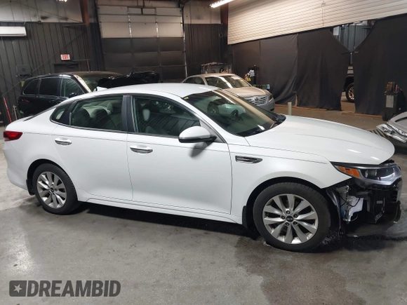 2018 Kia Optima LX z VIN 5XXGT4L34JG252028, wystawiony jako IAAI lot #41979909 z przebiegiem 90 113 mil mil oraz . Historia ofert i sprzedaży dostępna na DreamBid. Obrazek 14.