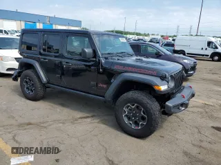 2023 Jeep Wrangler Rubicon with VIN 1C4HJXFG9PW561091, listed as a Copart auction lot 62660834 with 12,081 mi miles and Non Repairable. Bid and sale history available at DreamBid. Image 4.