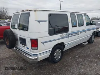 1996 Ford Econoline Cargo with VIN 1FDEE14N7THA03059, listed as a IAAI auction lot 41217045 with 139,435 mi miles and . Bid and sale history available at DreamBid. Image 4.