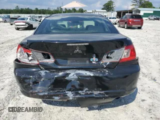 2012 Mitsubishi Galant FE z VIN 4A32B2FF2CE020409, wystawiony jako Copart lot #61199414 z przebiegiem 227 549 mil mil oraz Szkoda całkowita • Salvage title. Historia ofert i sprzedaży dostępna na DreamBid. Obrazek 6.
