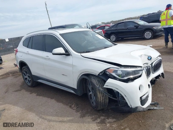 2018 BMW X1 xDrive28i with VIN WBXHT3C35J5K24695, listed as a IAAI auction lot 40932205 with 66,354 mi miles. Bid and sale history available at carsss.com. Image 1.