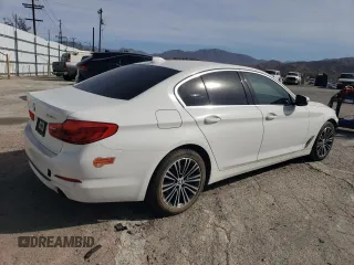 2020 BMW 5 Series 530e with VIN WBAJA9C0XLCD71591, listed as a Copart auction lot 79766234 with 115,358 mi miles and Salvage Title. Bid and sale history available at DreamBid. Image 3.