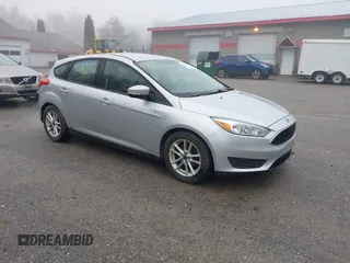 2015 Ford Focus SE with VIN 1FADP3K2XFL364856, listed as a IAAI auction lot 42190028 with 170,436 mi miles. Bid and sale history available at carsss.com. Image 1.