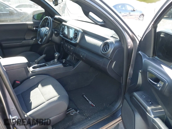 2017 Toyota Tacoma SR5 with VIN 5TFAZ5CNXHX050289, listed as a IAAI auction lot 41771576 with 68,735 mi miles and . Bid and sale history available at carsss.com. Image 5.